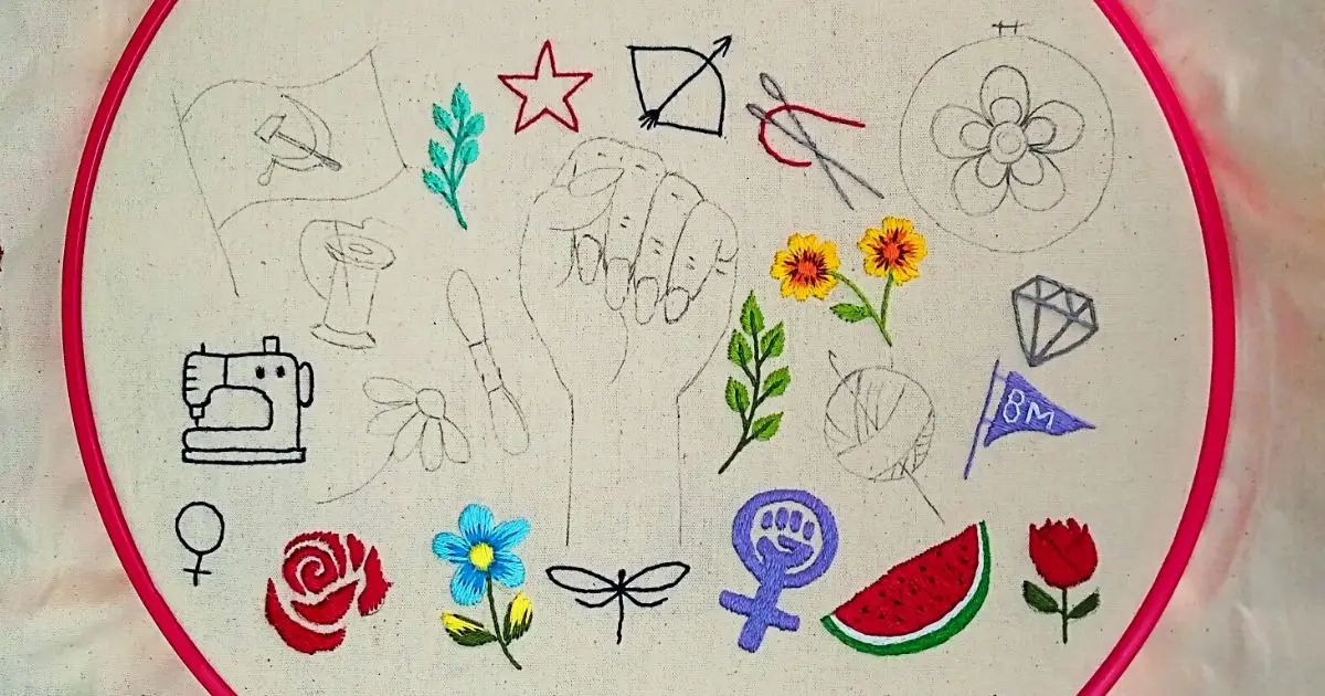 elementos bordados à mão para um banner do manifesto bordado do site agulhas da resistência da artesã andrea catão. são flores e folhas bordadas, além de símbolo feminista, uma máquina de costura, arci e flecha, agulhas e linha