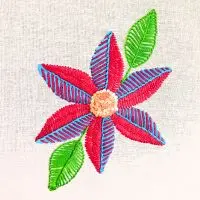 bordado à mão de flor criado pela artesã Andrea Catão