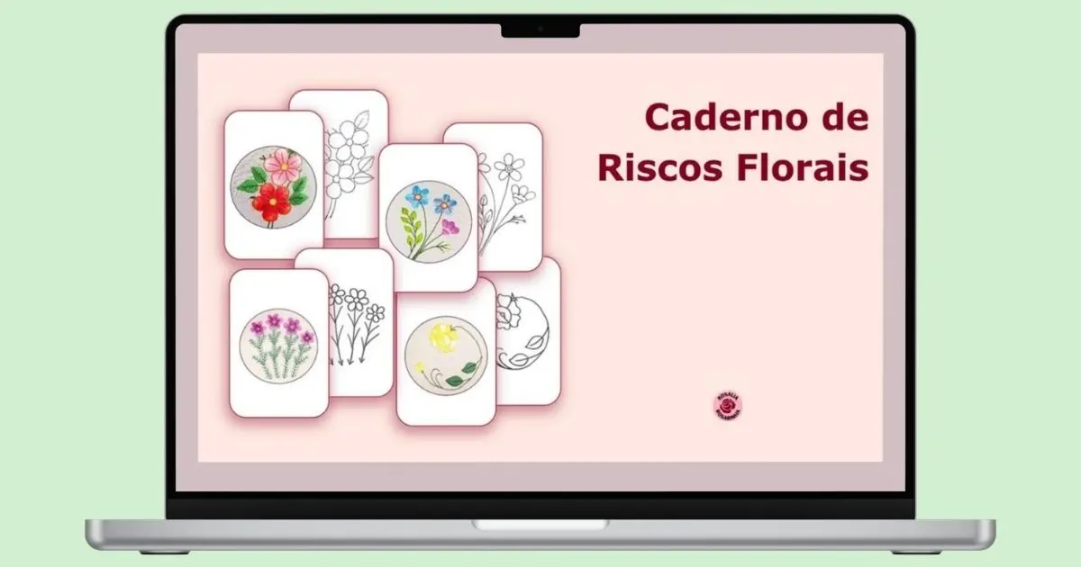 laptop aberto com a capa do ebook "caderno de riscos florais - rosália rosarinha", com o título em destaque e riscos e bordados à mão