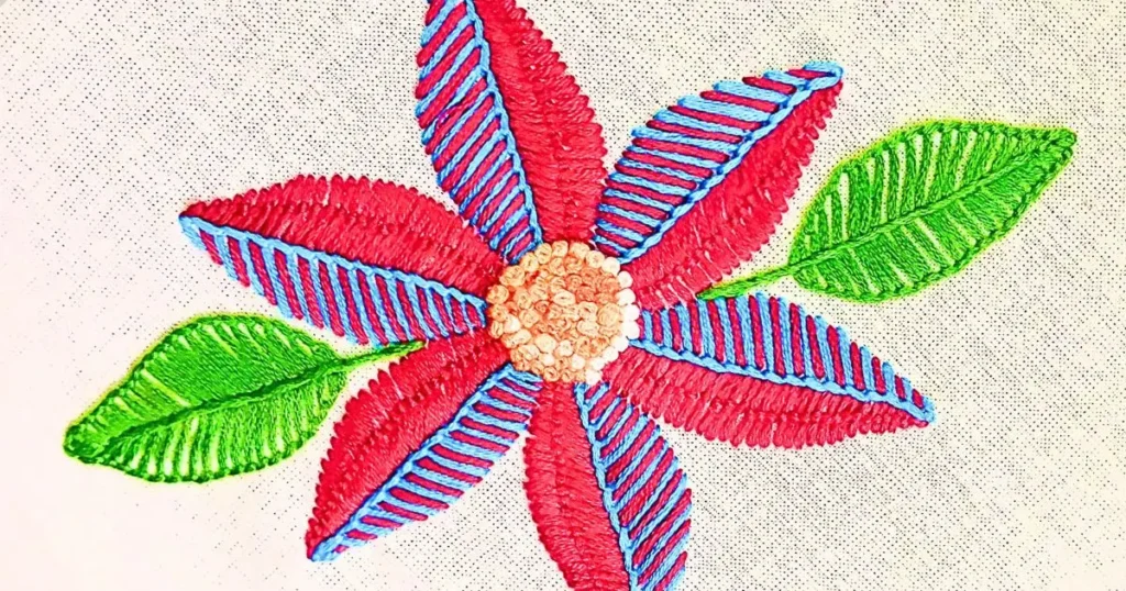 flor bordada com ponto aoanhado e ponto caseado. criado pela artesã andrea catão para o canal rosália rosarinha