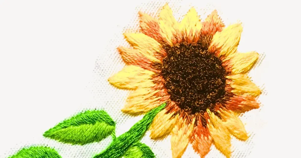 girassol bordado à mão preenchida com ponto caseado. criado pela artesã Andrea Catão para o canal Rosália Rosarinha