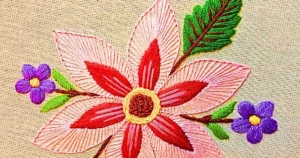 flor estrelada bordada à mão com ponto caseado e ponto cheio