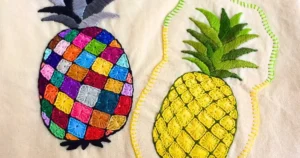 2 abacaxis bordados à mão com ponto caseado casa de botão. trabalho da artesã andrea catão para o canal rosália rosarinha bordado