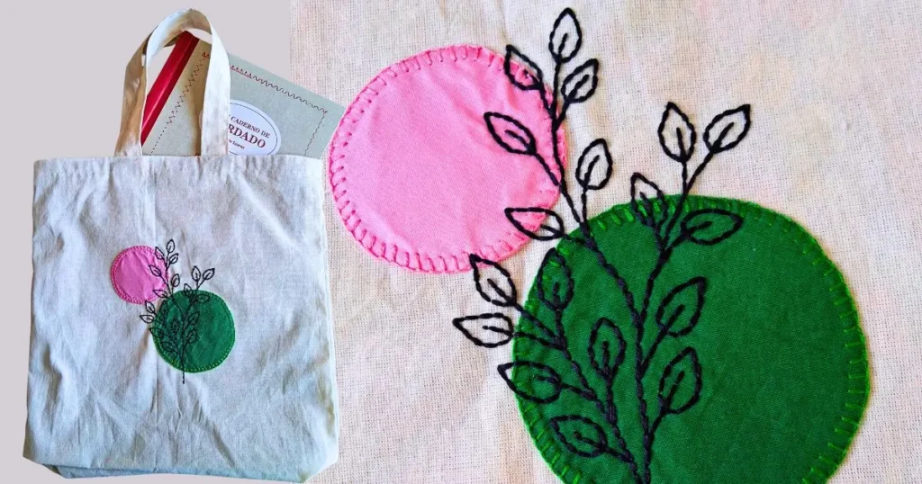 bordado à mão estilo boho e no detalhe o mesmo bordado numa ecobag de algodão com o livro meu caderno de bordado dentro da sacola. peça da artesã andrea catão para o canal rosália rosarinha e para o site agulhas da resistência